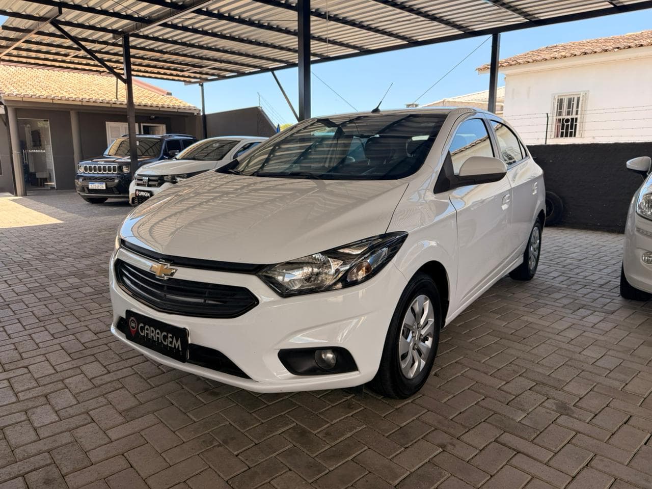 ONIX HATCH LT 1.0 8V FlexPower 5p Mec. - Imagem 2